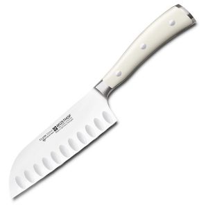 Couteau santoku avec rainures sur le bord